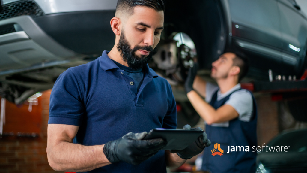 Automotive Engineer looking at monitor to show compliance with automotive agile SPICE.